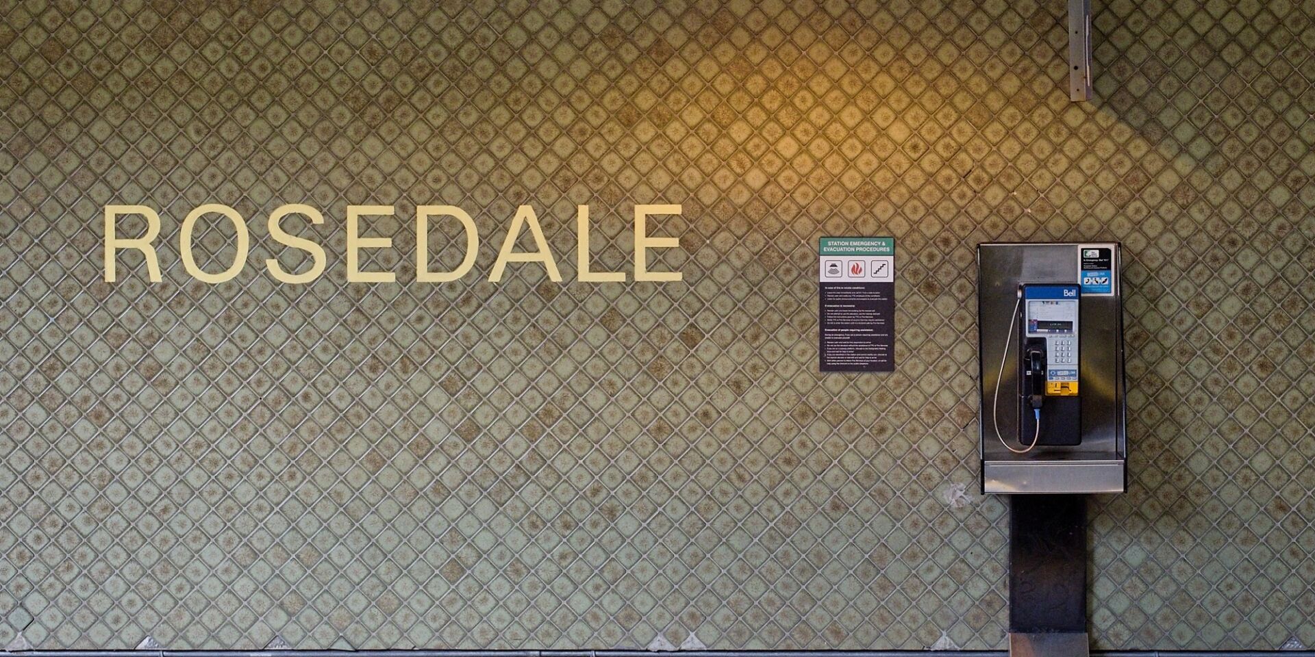 Track level station identification and pay phone.