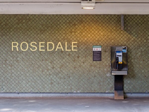 Track level station identification and pay phone.